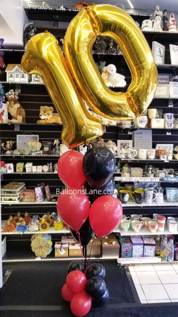 Gold 10 Number Balloons with red and black latex balloon bouquets to celebrate 10th birthday in NJ.