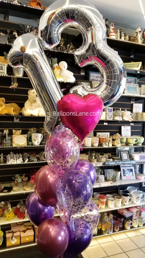Elegant Silver Number 1 and 3 Balloons with Heart Foil Balloon, Surrounded by Confetti Purple, Rose Gold, and Purple Balloons in NYC
