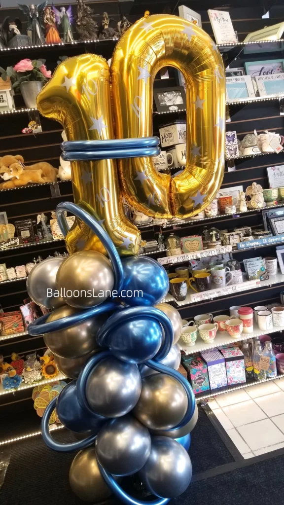 10 number balloon with chrome silver and blue balloons along with blue twisted balloons wrapped with number balloon arranged in bouquet to celebrate 10th birthday in Brooklyn.