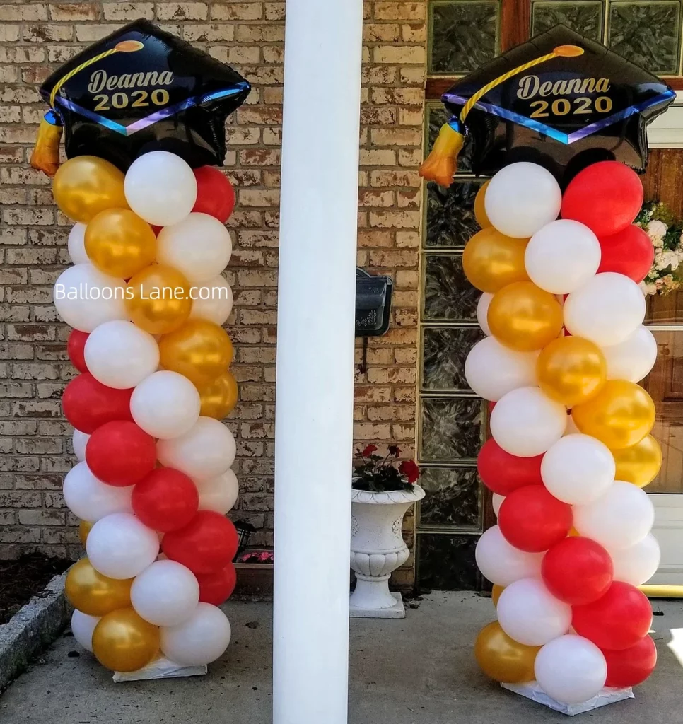 Graduation Celebration Balloon Column with Orange, White, and Red Balloons, Featuring Customized Graduation Cap Balloon in NYC