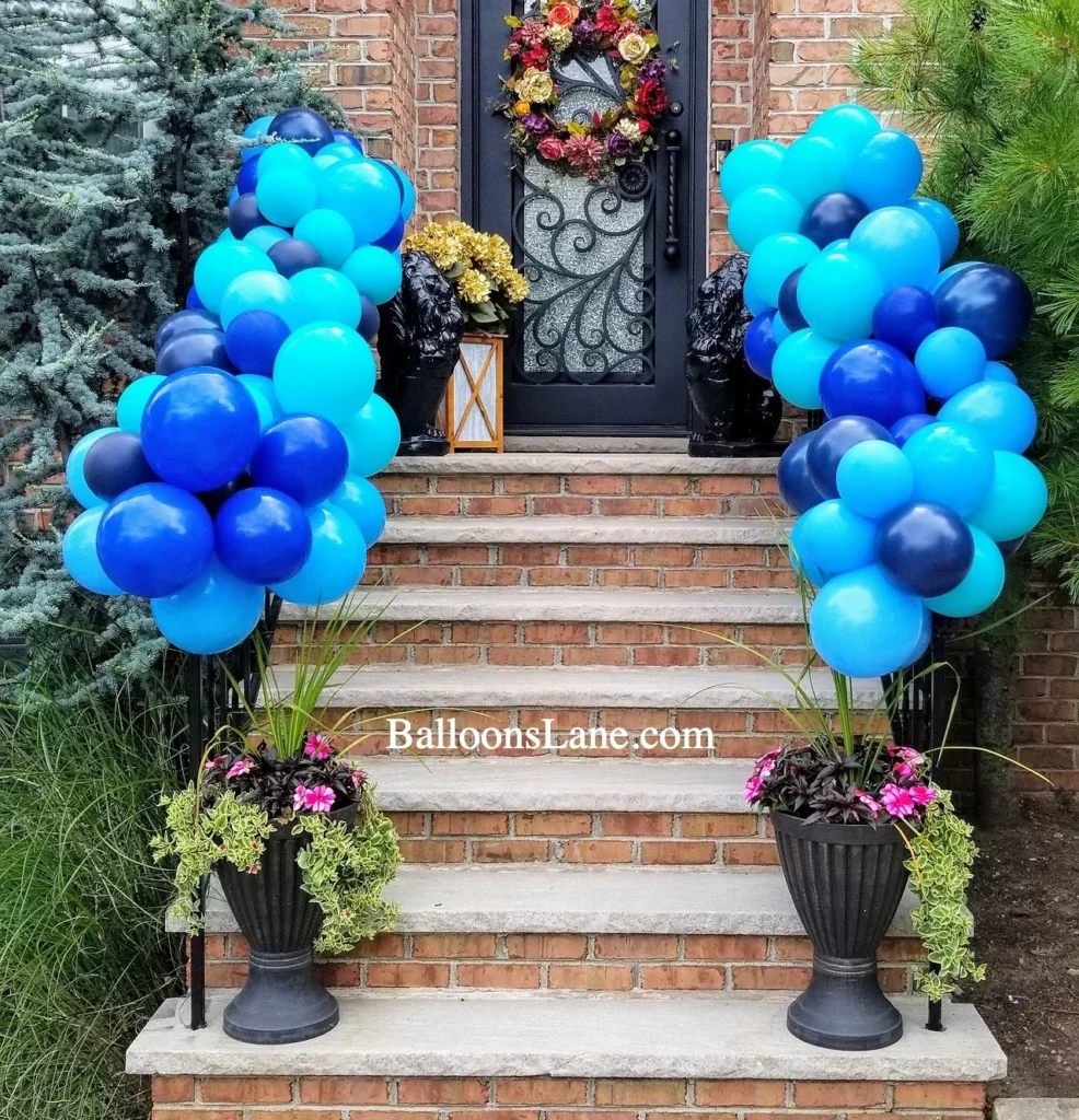 Shades of Blue Balloon Garland Adorning a Staircase