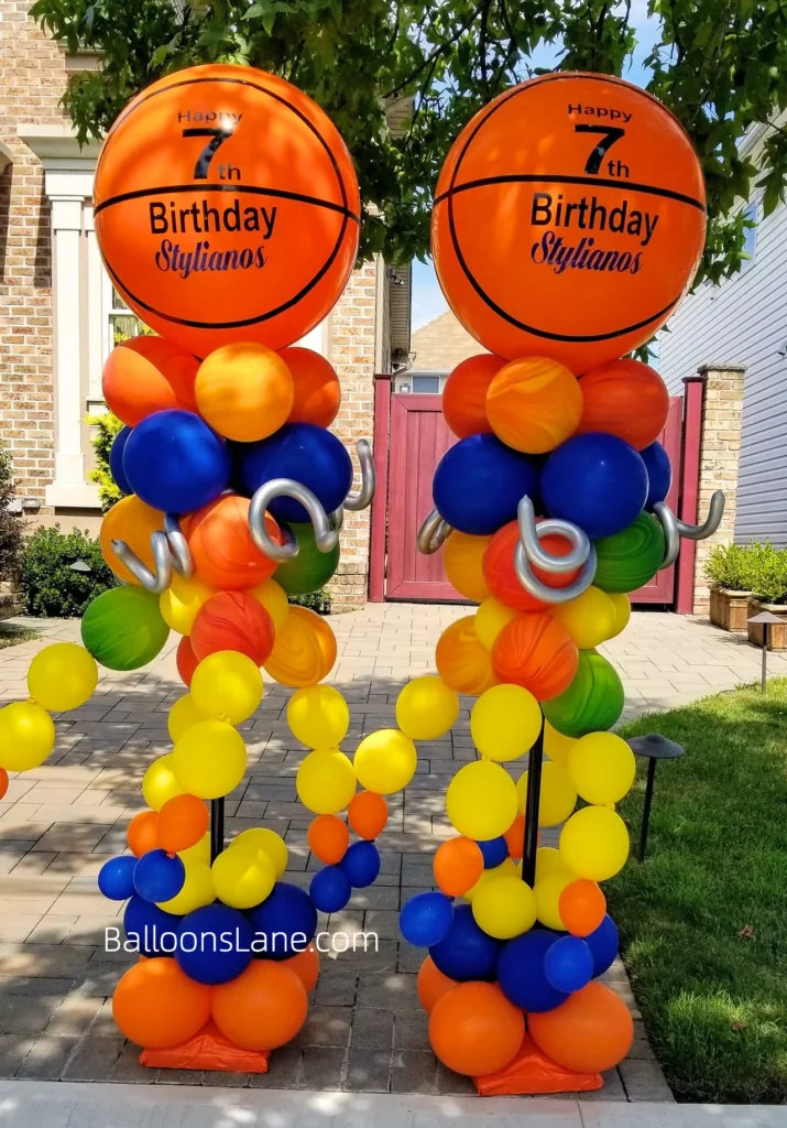 Personalized Happy Birthday Balloon Column with Large Orange Balloon, Blue, Orange, Green, and Yellow Balloons, and Twisted Balloons in Manhattan