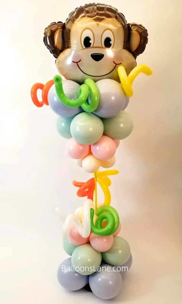 Pastel Safari-Themed Balloon Column with Yellow, Orange, and Green Twisted Balloons for Baby Shower Celebration in New York City