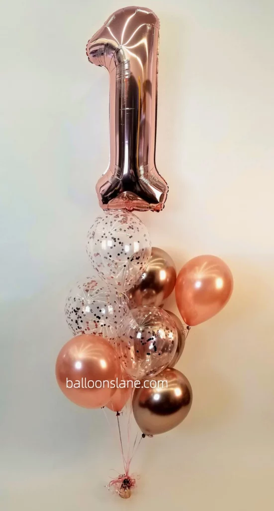 Rose gold "1" number balloon with confetti balloon and rose gold balloon bouquet in Brooklyn, NJ