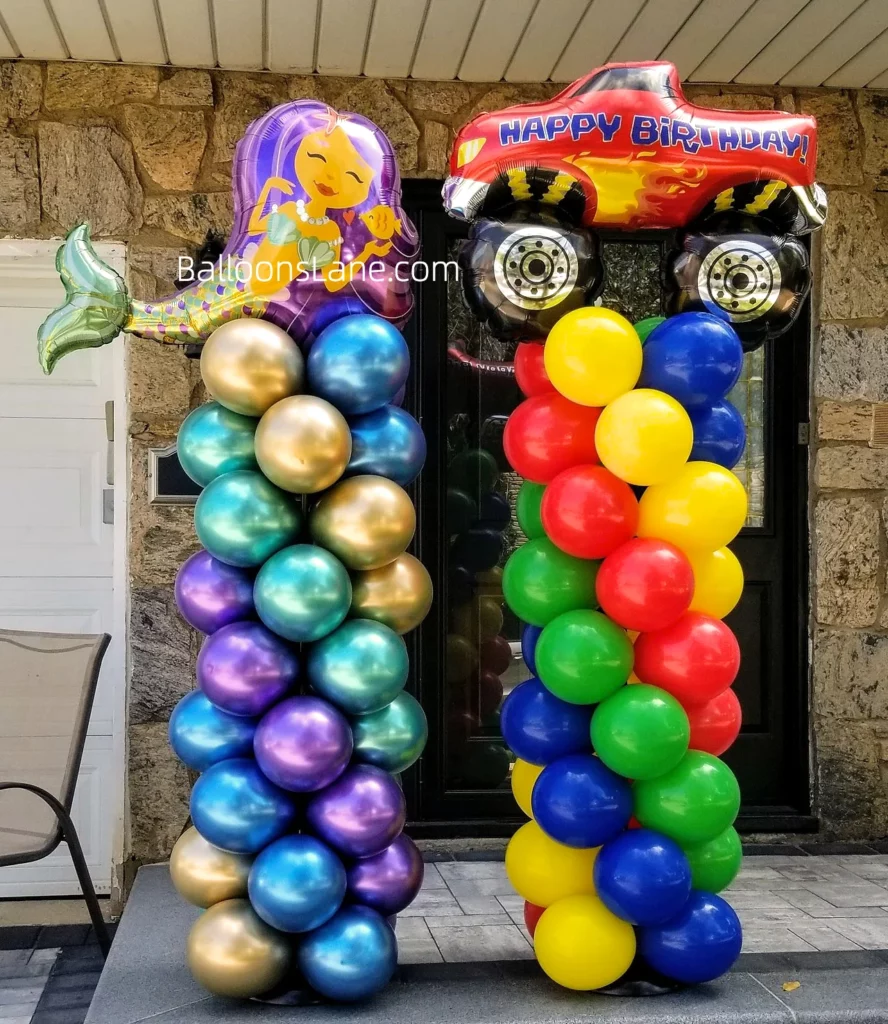 Colorful balloon decorations including a Happy Birthday car-themed foil balloon, red, yellow, and green balloons, and chrome gold and chrome purple balloon columns