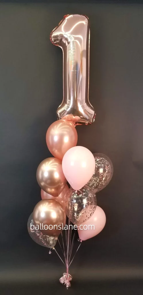 Rose gold "1" number balloon with confetti balloon and rose gold balloon bouquet in Brooklyn