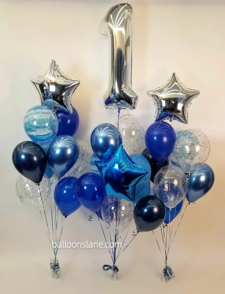 Shades of blue with textured blue balloon, star balloon, and silver number balloon to celebrate 1st birthday in New York City