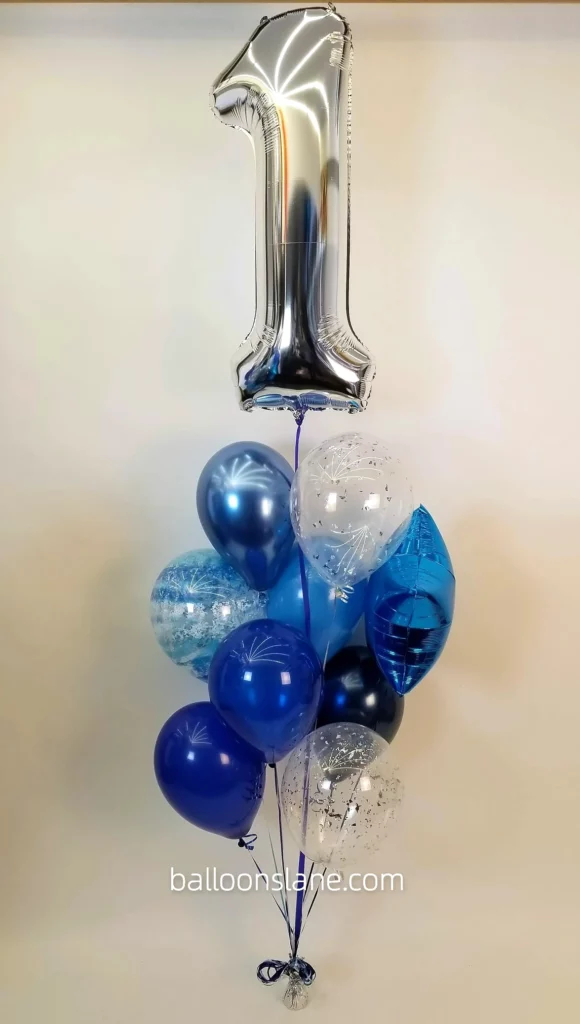 Shades of blue with textured blue balloon, star balloon, and silver number balloon to celebrate 1st birthday in New York City