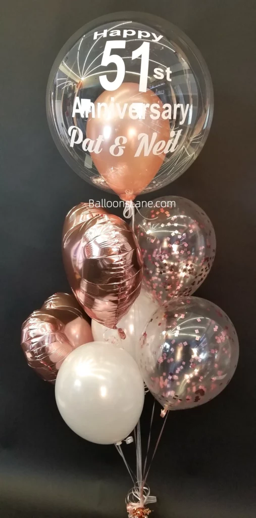 Happy Anniversary" balloons with rose gold, confetti, and white balloon bouquets in Brooklyn