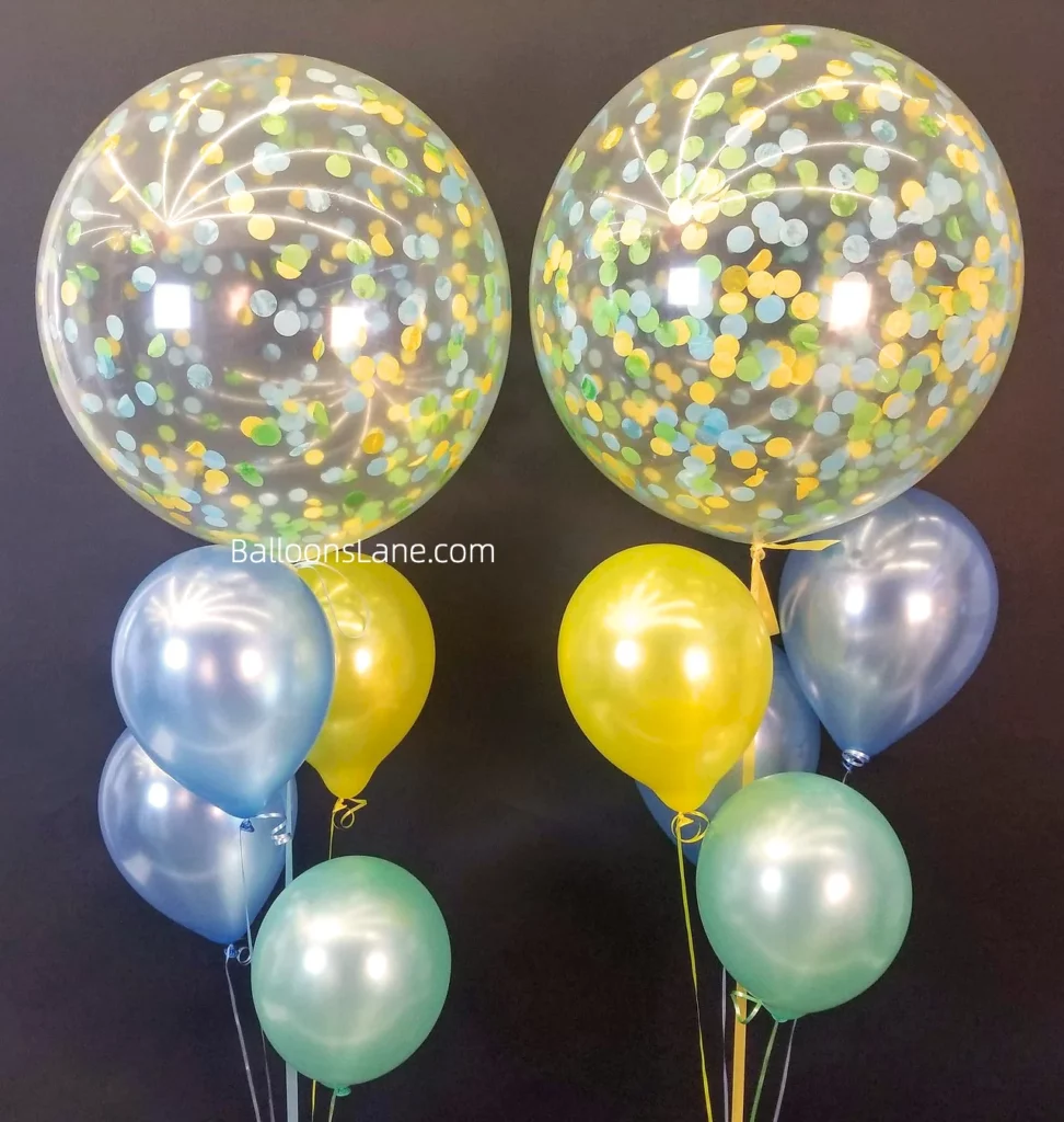 Blue and yellow bubble balloon with mint green, yellow, and blue balloons arranged in bouquet to celebrate birthday in Brooklyn