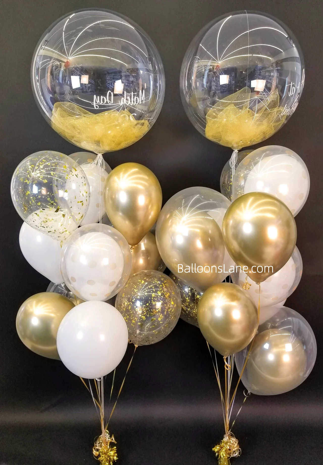 feather balloon with golda nd white balloons arranged in balloons bouquet to celebrate engagment in NJ