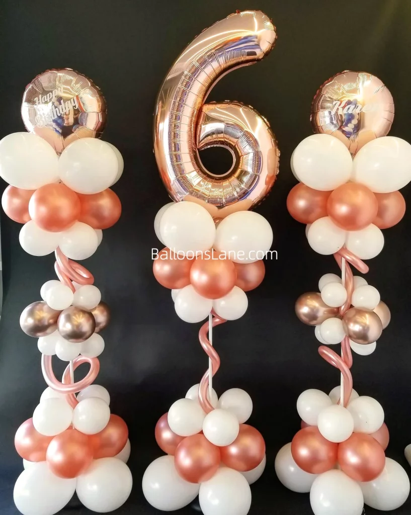 Rose gold number 6 balloon with rose gold heart and twisted balloon, along with white, confetti, and pink balloons arranged in a bouquet to celebrate 6th birthday in NJ