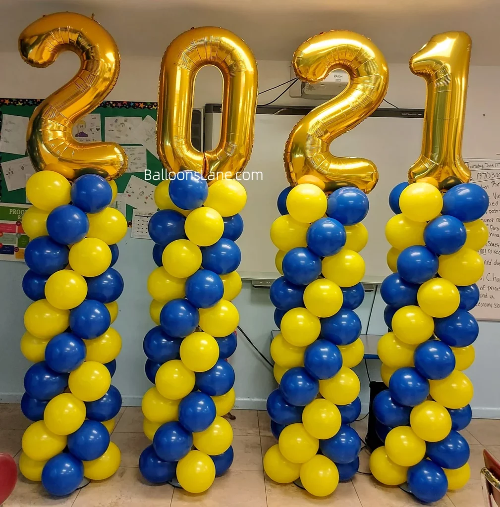 Column made of yellow and balloon balloons with gold Mylar letter balloons on top.