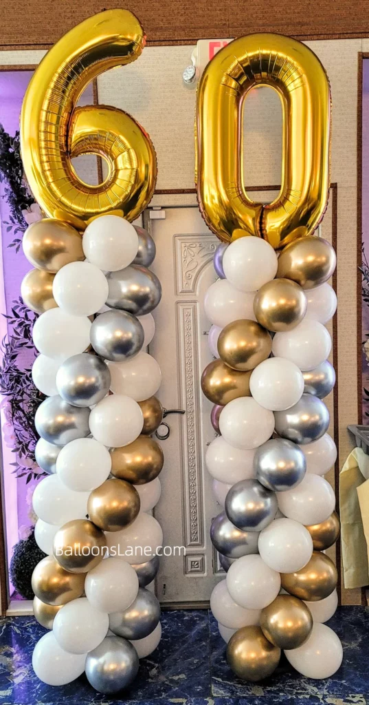 Gold number balloons with chrome and white balloon columns to celebrate sweet 60 and 60th birthday/anniversary in Brooklyn