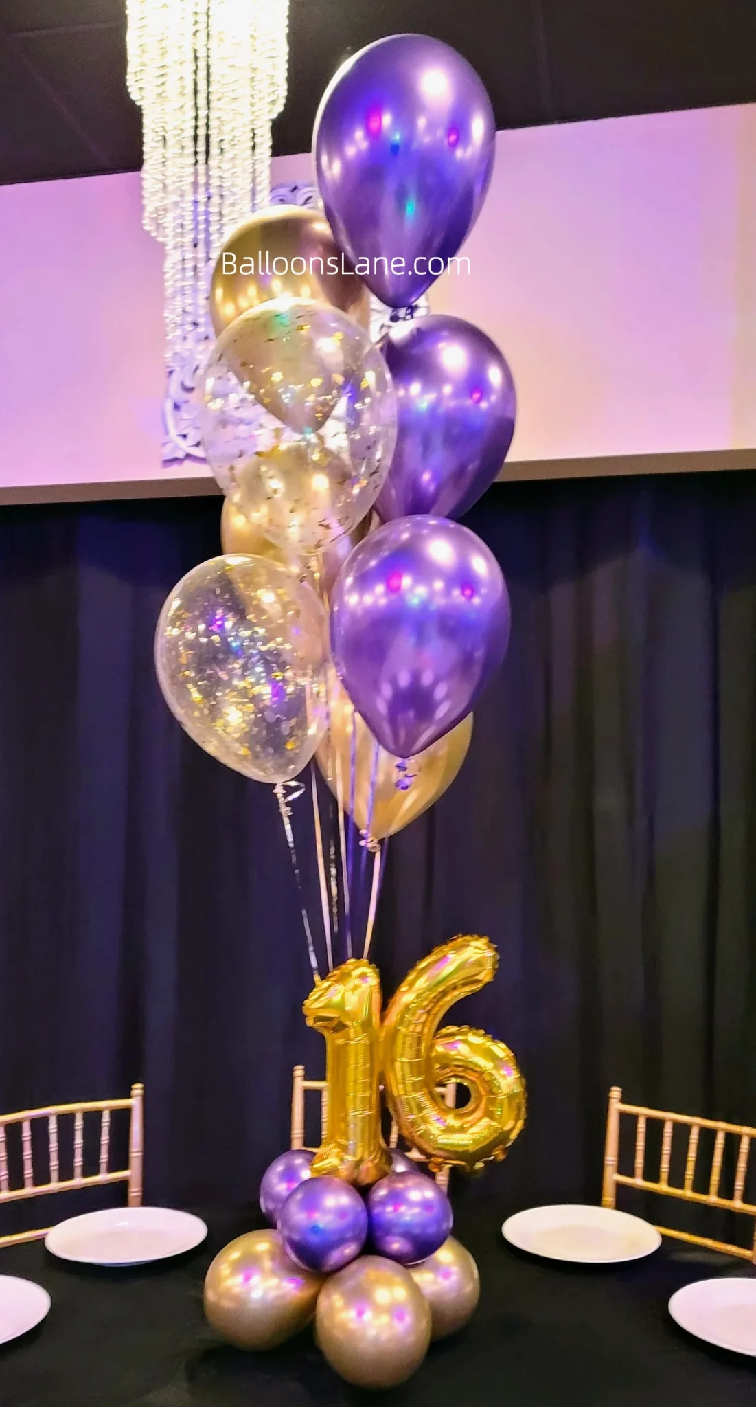 Small Number balloons 1 & 6 atop a bouquet arrangement featuring gold and purple latex balloons, a gold foil balloon, and gold confetti balloons to celebrate a birthday and anniversary in Manhattan.