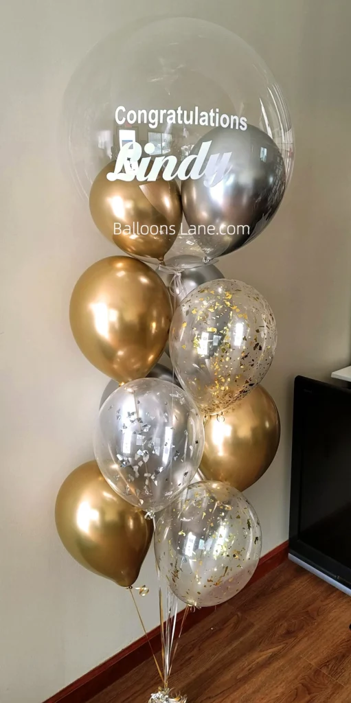 Congratulations Bubble Foil Balloon with Gold and Silver Latex Balloons, Accompanied by Gold Foil Balloon to Celebrate Graduation in New York City