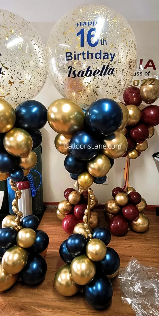 Customized 16th birthday balloon bouquet with blue and gold chrome balloons in NYC