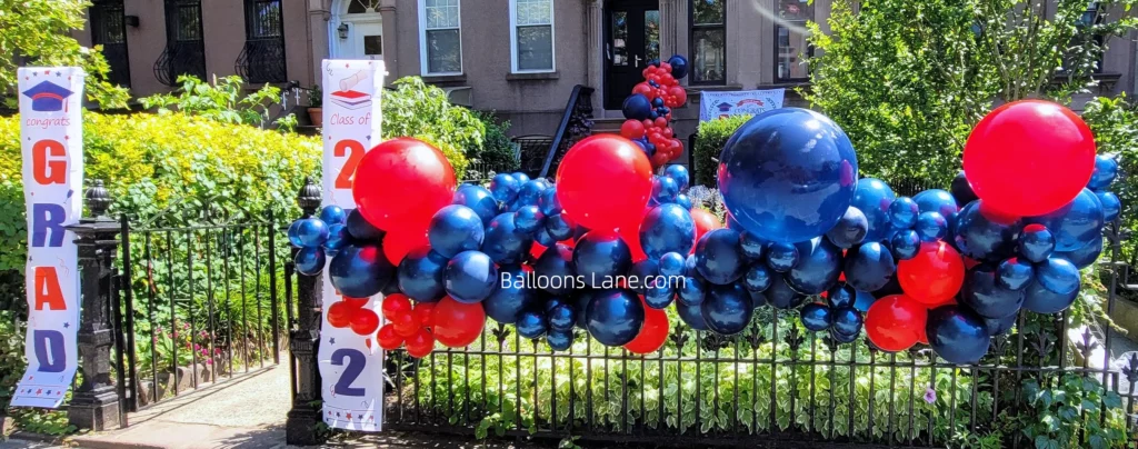 Whimsical Blue & Red Balloon Garland Adorning a Brooklyn Staircase for Birthday, Wedding, or Engagement Celebrations