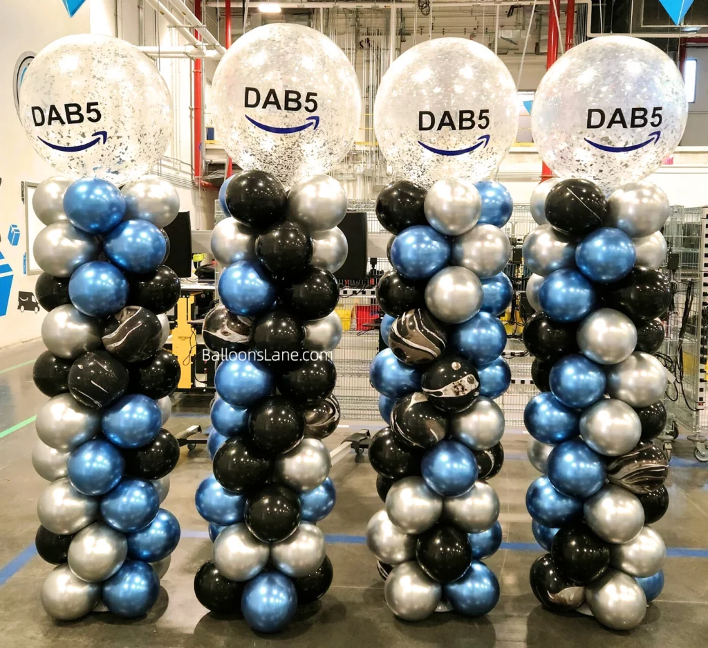 Customized balloon column featuring a large confetti balloon, adorned with chrome black, blue, and silver balloons, perfect for celebrating school events in NYC.