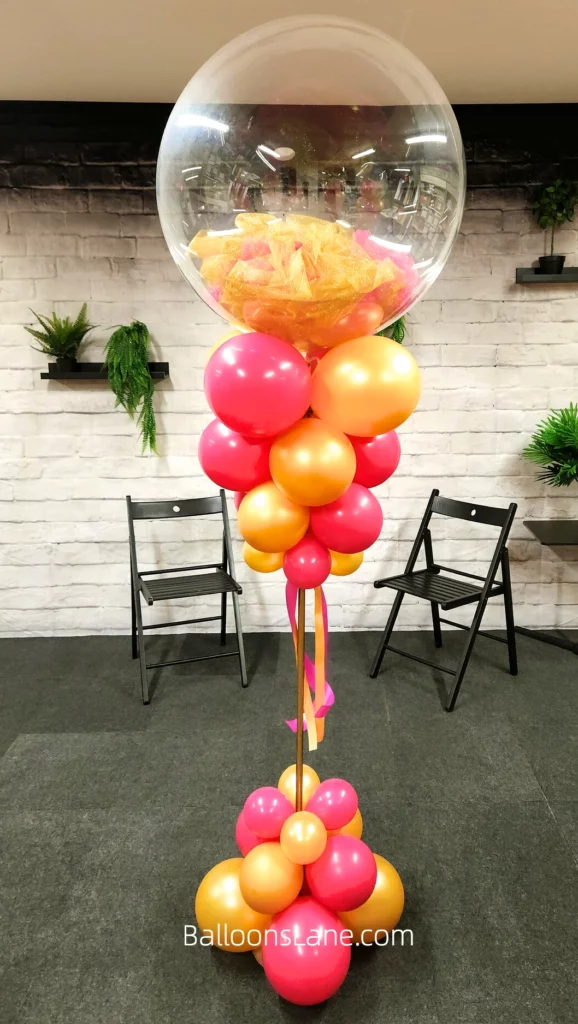 Bubble Balloon with Orange and Pink Balloon Column Arranged with Ribbon to Celebrate Birthday in NJ