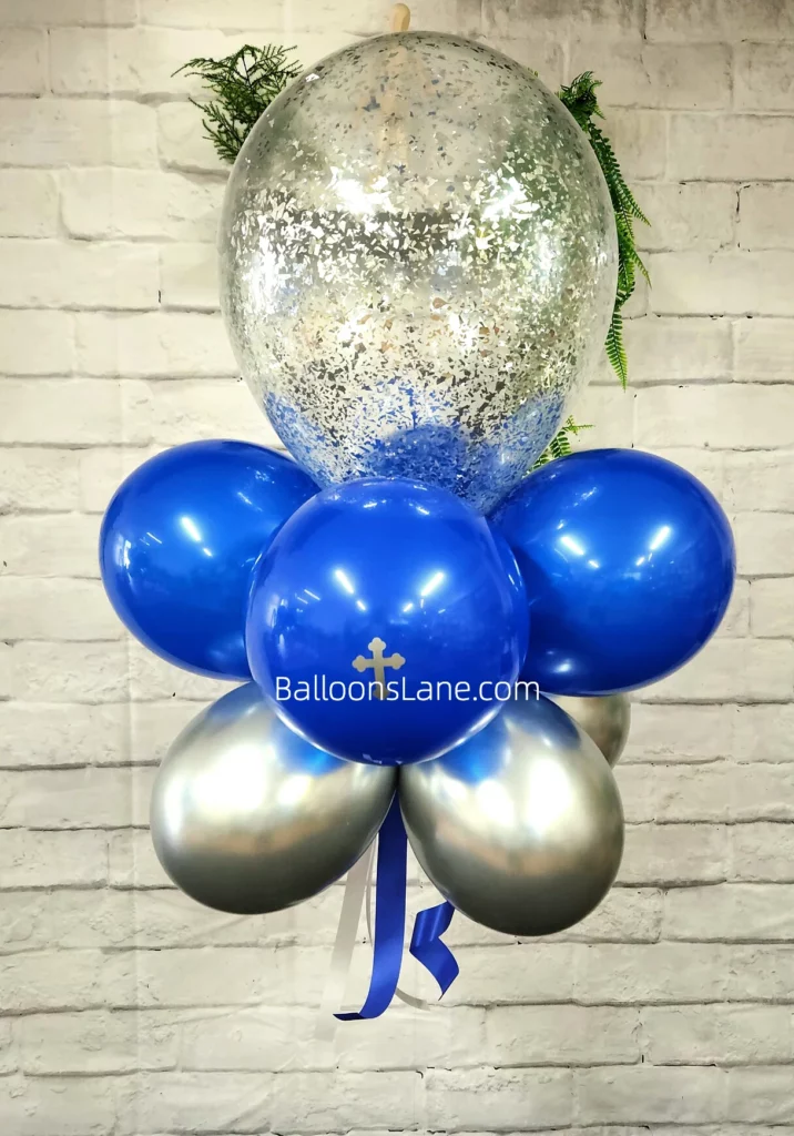 Balloon bouquets for christening featured silver and blue balloons with a cross-shaped Mylar balloon in Staten Island.