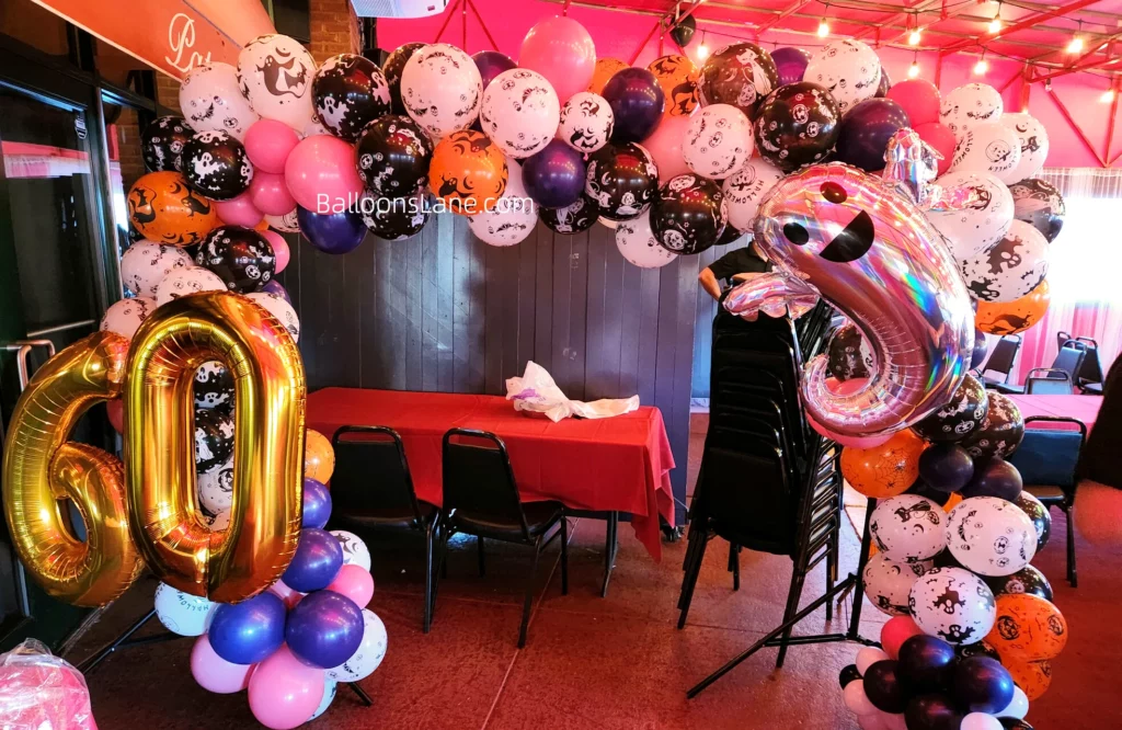 Balloons featured a sea print in black, white, pink and orange, accompanied by number balloons "6" and "0" and fish balloons.