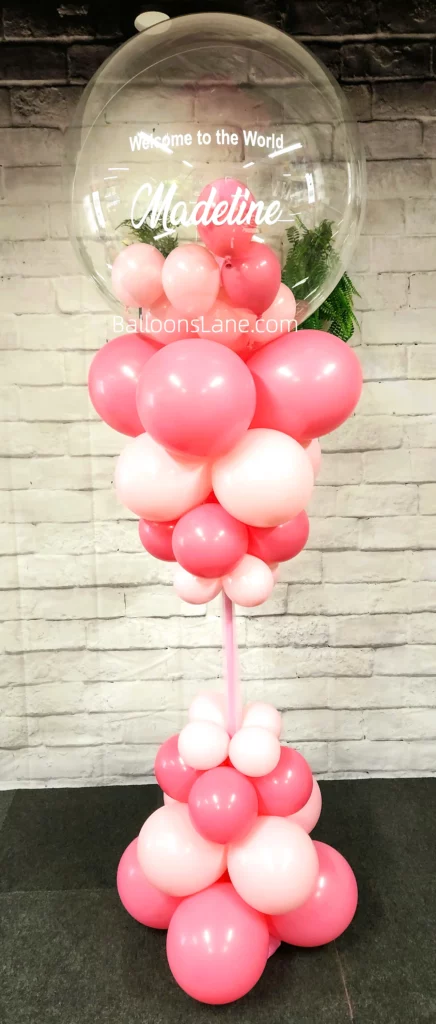 Clear Customized Balloon with Shades of Pink Balloon Column for Gender Reveal Event in Brooklyn
