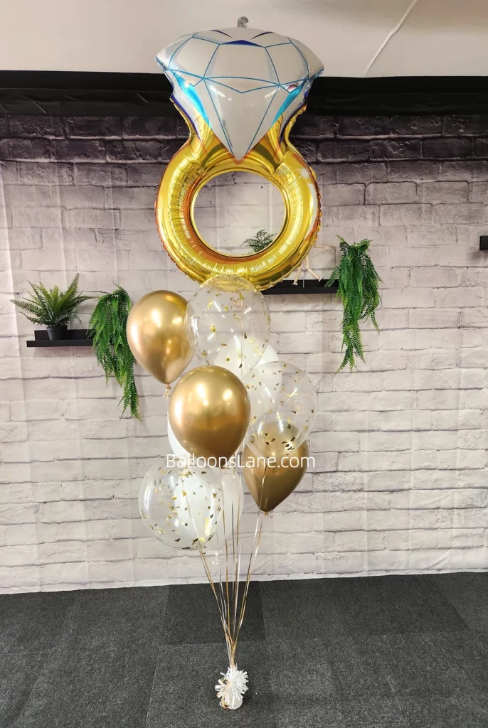 Custom Gold Balloon Bouquet with Clear, White, and Gold Confetti Balloons in NYC