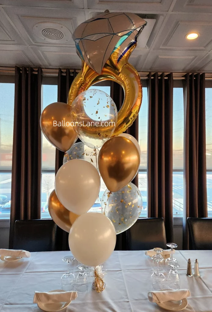 Engagement ring balloon bouquet with confetti and white balloons