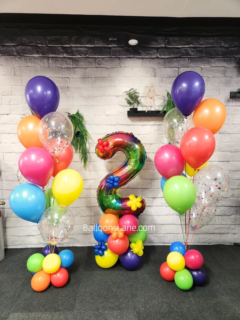 Two large number balloons in multi-color along with matching color balloon bouquets in NJ