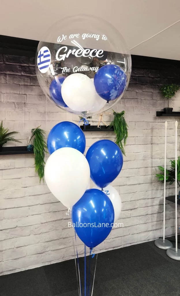 Customized balloon bouquets in blue and white for Greece-themed event in Staten Island.