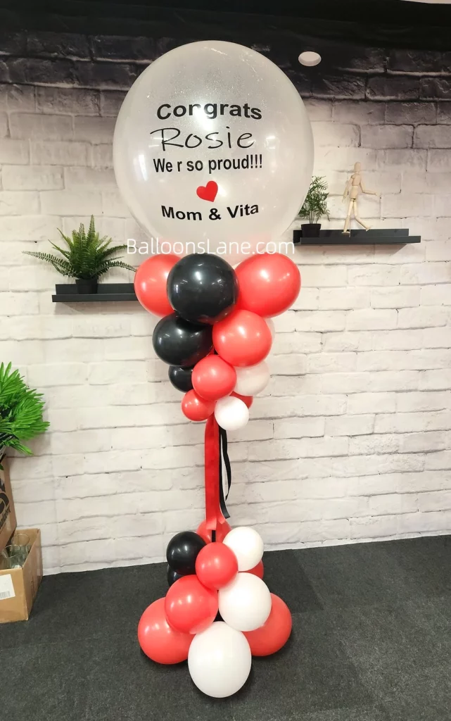Large clear personalized balloon in brooklyn in with black, red and white balloon to celebrate birthday in Brooklyn