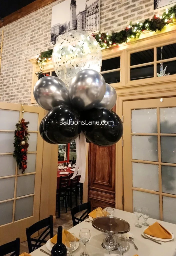 Clear confetti balloon with grey and black chrome balloons in Staten Island to celebrate engagement in Brooklyn