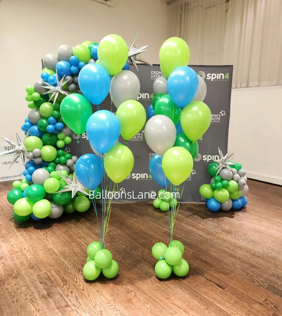 Green and Blue Balloon Column and backdrop in NJ to Celebrate Sports Day in NYC