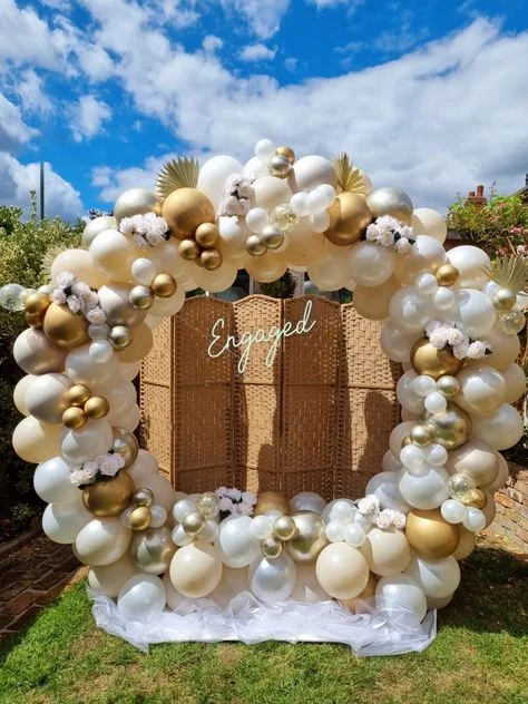 Engagement Party Balloon Backdrop with White, Cream, Silver, and Gold Balloons in Manhattan