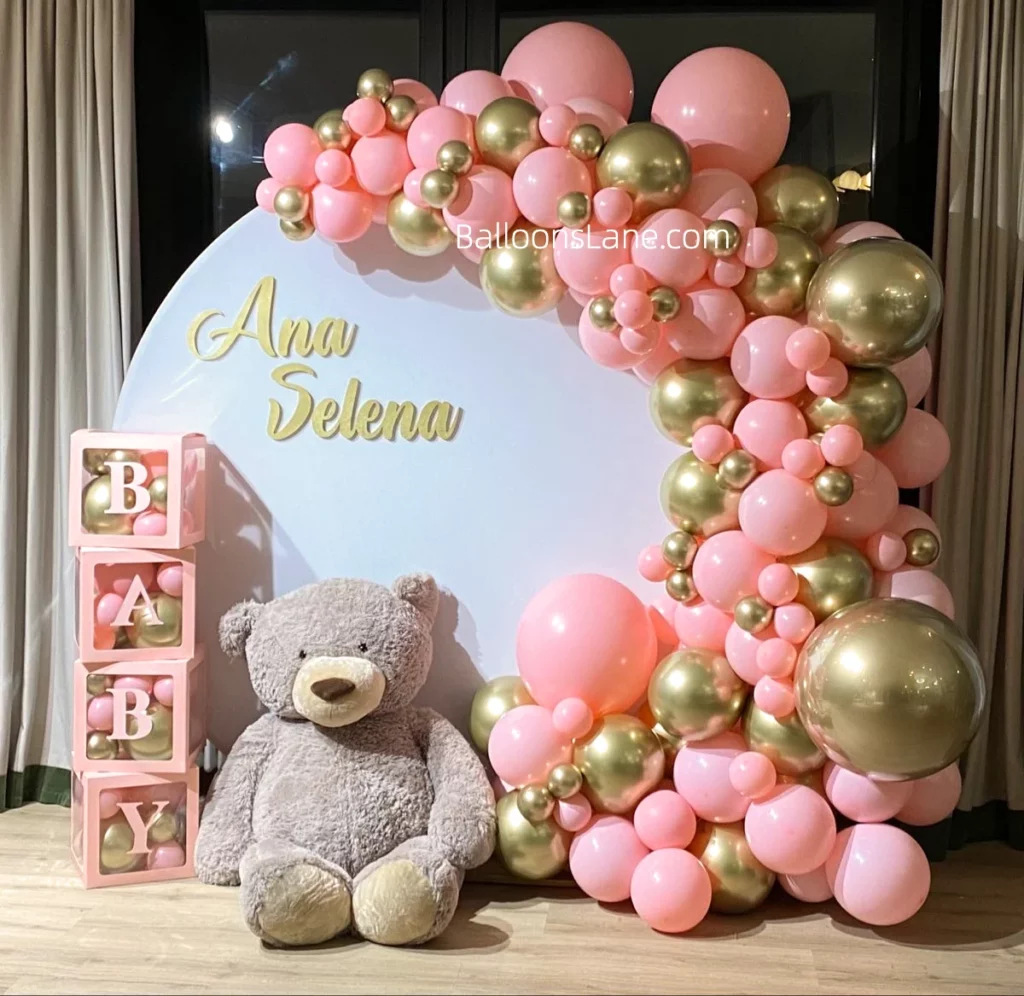 Pink Balloon Arrangement with Large and Small Balloons, Along with Gold Latex Balloons in NYC to Celebrate Birthday