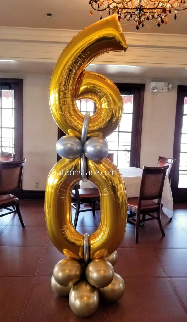 Gold 60 Number Balloon with gold and silver balloon bouquet to celebrate 60th birthday in NJ.