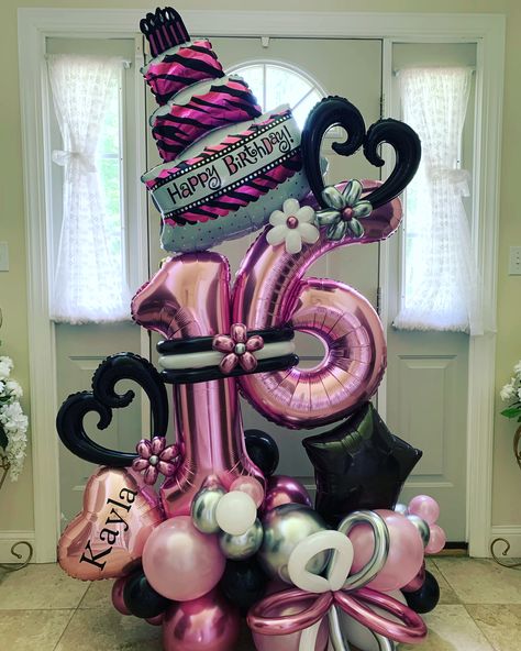 Customized Sweet 16 birthday balloon bouquet featuring foil cake balloon, heart-shaped balloon, twisted pink, white, and silver balloons, and number 1 & 6 balloons in NYC.
