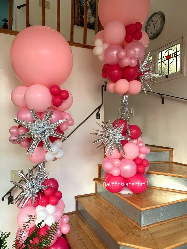 Valentine's Day Celebration in Brooklyn with Large Pink Balloon, Dark Pink Balloons, and Star Foil Balloons Arranged in a Column
