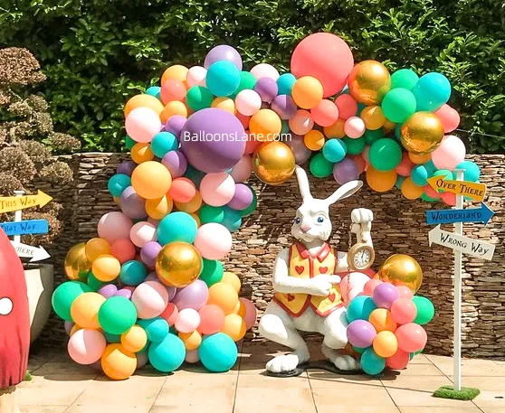 Easter balloon arrangement featured multi-sized balloons, latex balloons, and chrome balloons in vibrant colors including yellow, red, green, pink, blue, purple, and gold, set in Brooklyn.