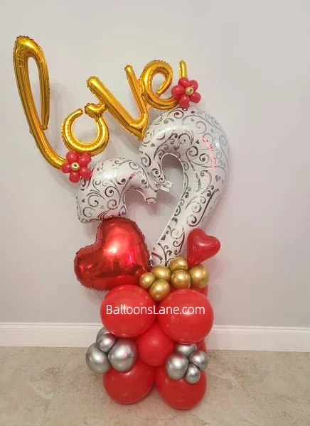 LOVE letter balloons along with rd foil and latex ballons bouquet with 3d white printed heart shape balloon to celebrate valentines day in Brooklyn