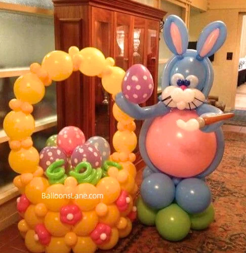 Balloon basket with bunny made from orange, purple, green, and pink balloons to celebrate Easter in Brooklyn.