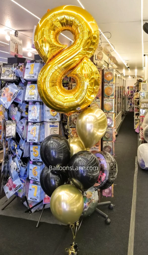 8th Birthday Party Balloon Bouquet in Gold and Black