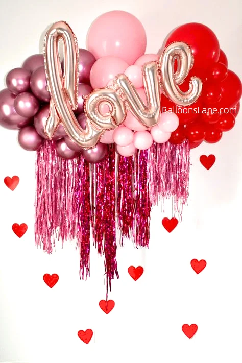Celebrate Valentine's Day in Staten Island with Beautiful Rose Gold and Red Chrome Balloons, Along with Love Letter Balloons Arranged in a Backdrop