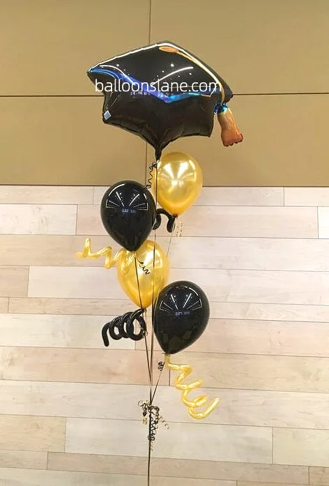 Graduation Cap Foil Balloon with Black and Gold Latex Balloons and Spring Balloon Bouquet in Staten Island