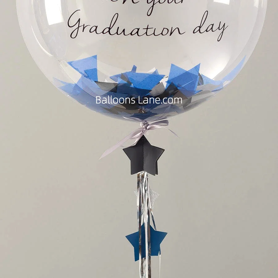 Feather Balloon Customized with "On Your Graduation" Message, Adorned with Black and Gold String in Brooklyn