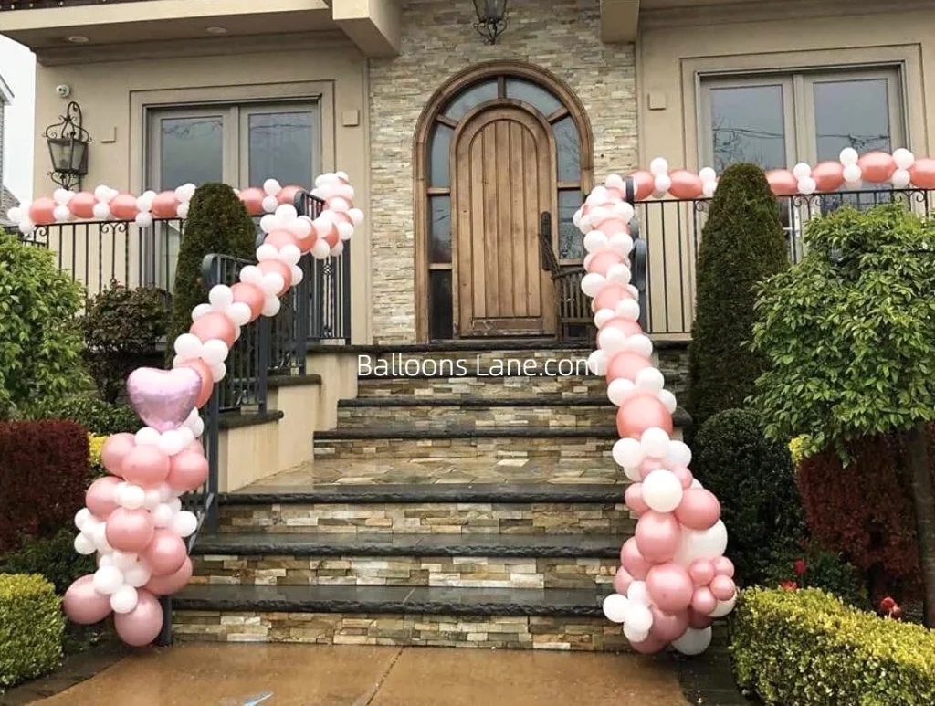 Stylish White, Pink, and Gold Balloon Garland Decorating a Brooklyn Staircase