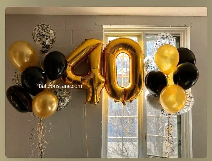 A dazzling bouquet featuring a gold foil number "40" balloon surrounded by gold and white balloons, perfect for a 40th birthday celebration.