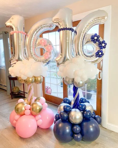 A display featuring white number balloons 1 & 6, along with customized birthday balloons in pink and white, and a bouquet of pink and rose gold balloons in NYC.