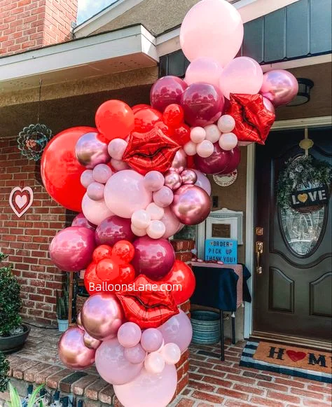 Celebrate Love on Valentine's Day in Staten Island with Red Foil Lip Balloon and a Pink, Red, Purple, and Rose Gold Balloon Garland